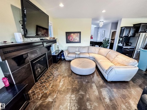 3438 West Landing, Edmonton, AB - Indoor Photo Showing Living Room With Fireplace