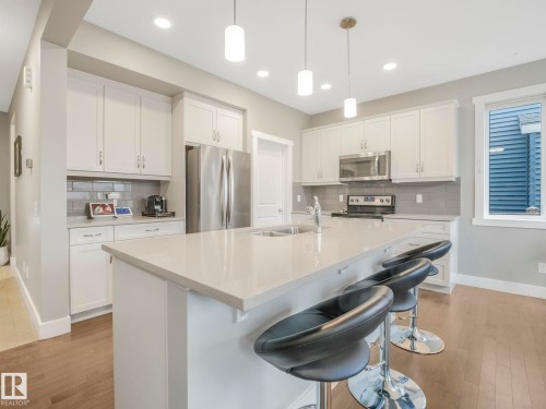3613 Cherry Link Link, Edmonton, AB - Indoor Photo Showing Kitchen With Stainless Steel Kitchen With Double Sink With Upgraded Kitchen