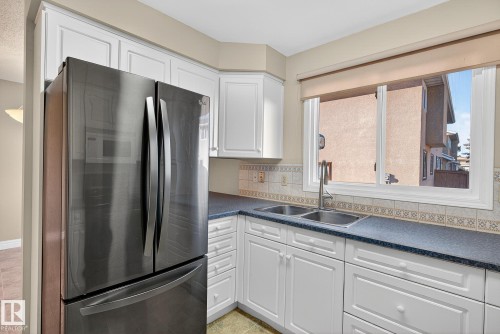 10948 Beaumaris Road, Edmonton, AB - Indoor Photo Showing Kitchen With Double Sink