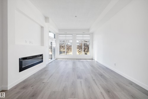 200 10531 117 Street, Edmonton, AB - Indoor With Fireplace