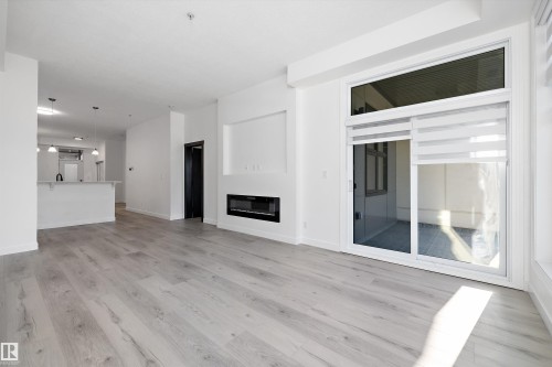 200 10531 117 Street, Edmonton, AB - Indoor With Fireplace