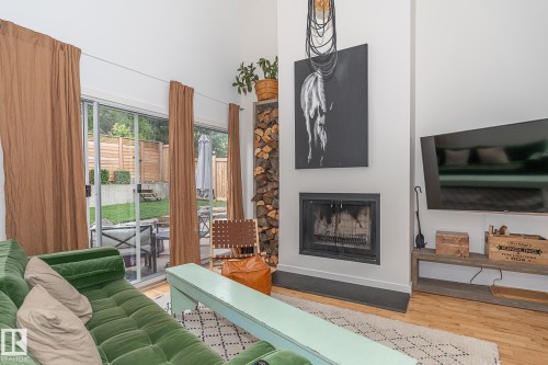 12211 42A Avenue, Edmonton, AB - Indoor Photo Showing Living Room With Fireplace