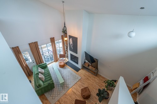 12211 42A Avenue, Edmonton, AB - Indoor Photo Showing Other Room With Fireplace