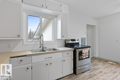 4206 50 Avenue, Camrose, AB - Indoor Photo Showing Kitchen With Double Sink