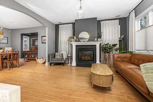 10823 125 Street, Edmonton, AB - Indoor Photo Showing Living Room With Fireplace