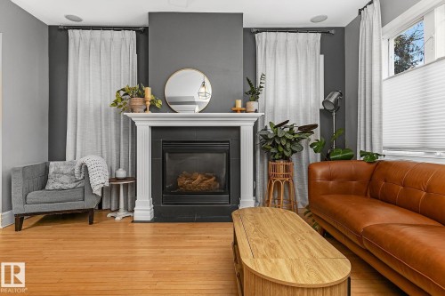 10823 125 Street, Edmonton, AB - Indoor Photo Showing Living Room With Fireplace