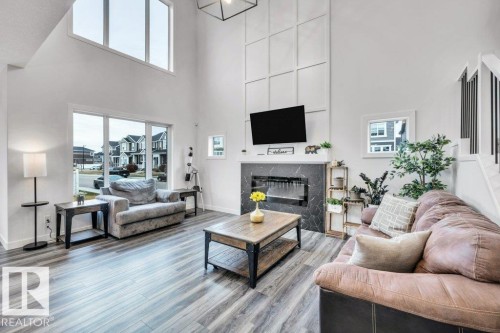 560 Stout Bend, Leduc, AB - Indoor Photo Showing Living Room With Fireplace