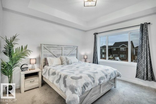 560 Stout Bend, Leduc, AB - Indoor Photo Showing Bedroom