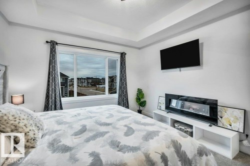 560 Stout Bend, Leduc, AB - Indoor Photo Showing Bedroom