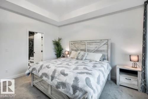 560 Stout Bend, Leduc, AB - Indoor Photo Showing Bedroom