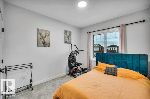 560 Stout Bend, Leduc, AB - Indoor Photo Showing Bedroom