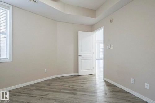 100 4835 104A Street Nw, Edmonton, AB - Indoor Photo Showing Other Room