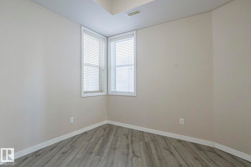 100 4835 104A Street Nw, Edmonton, AB - Indoor Photo Showing Other Room