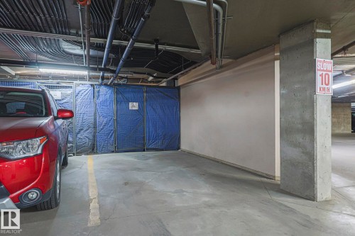 100 4835 104A Street Nw, Edmonton, AB - Indoor Photo Showing Garage