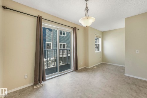 28 8304 11 Avenue, Edmonton, AB - Indoor Photo Showing Other Room