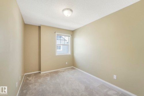 28 8304 11 Avenue, Edmonton, AB - Indoor Photo Showing Other Room