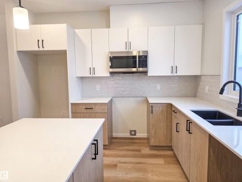 85 Brickyard Drive, Stony Plain, AB - Indoor Photo Showing Kitchen With Double Sink