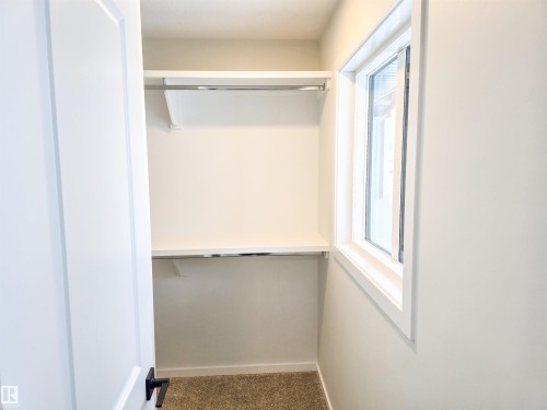 85 Brickyard Drive, Stony Plain, AB - Indoor With Storage