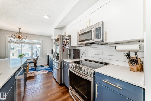 1077 Cy Becker Road, Edmonton, AB - Indoor Photo Showing Kitchen With Upgraded Kitchen