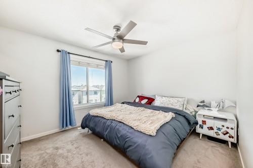 1077 Cy Becker Road, Edmonton, AB - Indoor Photo Showing Bedroom