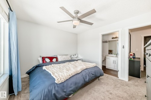 1077 Cy Becker Road, Edmonton, AB - Indoor Photo Showing Bedroom