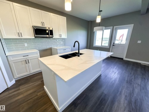 20 Eton Link, Spruce Grove, AB - Indoor Photo Showing Kitchen With Double Sink With Upgraded Kitchen