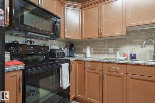 116 4450 Mccrae Avenue Nw, Edmonton, AB - Indoor Photo Showing Kitchen