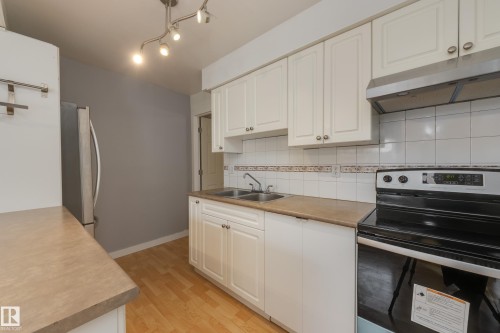 161 Royal Road, Edmonton, AB - Indoor Photo Showing Kitchen With Double Sink