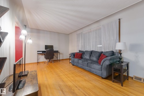 7315 83 Street, Edmonton, AB - Indoor Photo Showing Living Room