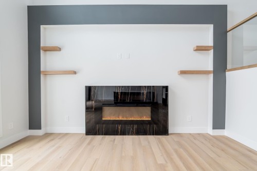 615 Astoria Way, Devon, AB - Indoor Photo Showing Living Room With Fireplace