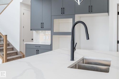 615 Astoria Way, Devon, AB - Indoor Photo Showing Kitchen With Double Sink