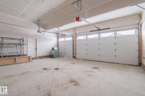 615 Astoria Way, Devon, AB - Indoor Photo Showing Garage