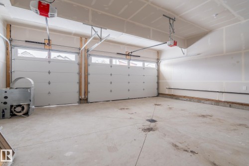 615 Astoria Way, Devon, AB - Indoor Photo Showing Garage
