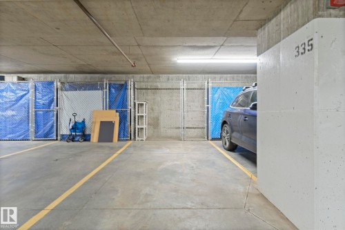 213 11080 Ellerslie Road, Edmonton, AB - Indoor Photo Showing Garage