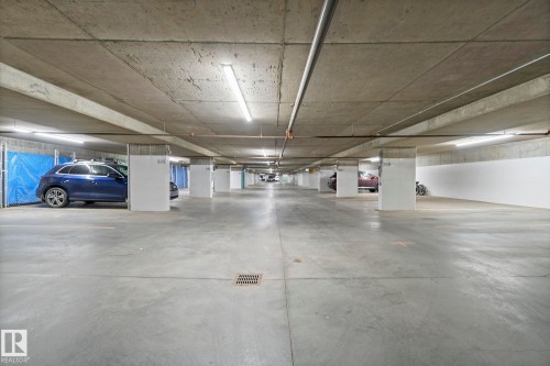 213 11080 Ellerslie Road, Edmonton, AB - Indoor Photo Showing Garage