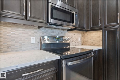 213 11080 Ellerslie Road, Edmonton, AB - Indoor Photo Showing Kitchen With Upgraded Kitchen