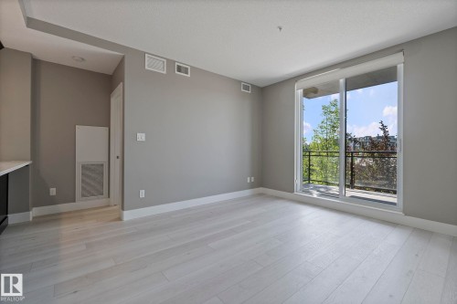 213 11080 Ellerslie Road, Edmonton, AB - Indoor With Fireplace