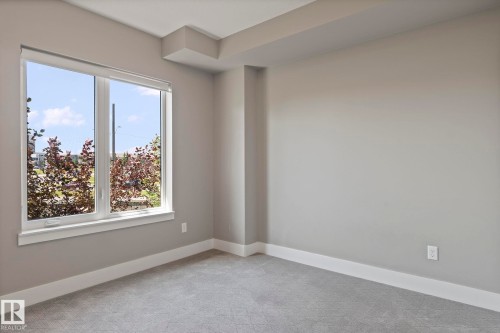 213 11080 Ellerslie Road, Edmonton, AB - Indoor Photo Showing Other Room