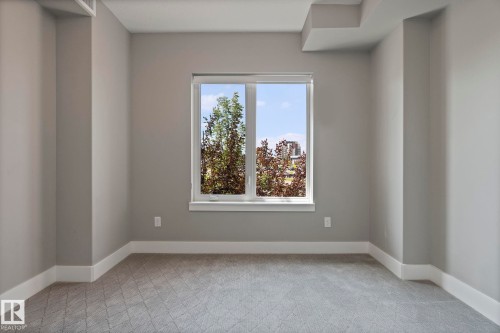 213 11080 Ellerslie Road, Edmonton, AB - Indoor Photo Showing Other Room
