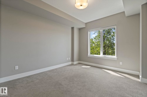 213 11080 Ellerslie Road, Edmonton, AB - Indoor Photo Showing Other Room
