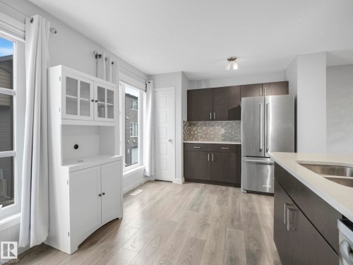 11 4470 Prowse Road, Edmonton, AB - Indoor Photo Showing Kitchen With Stainless Steel Kitchen With Double Sink