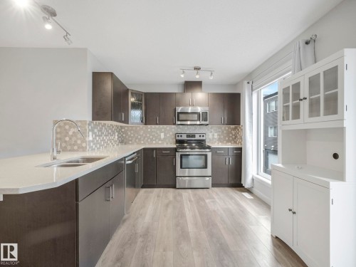 11 4470 Prowse Road, Edmonton, AB - Indoor Photo Showing Kitchen With Stainless Steel Kitchen With Double Sink With Upgraded Kitchen