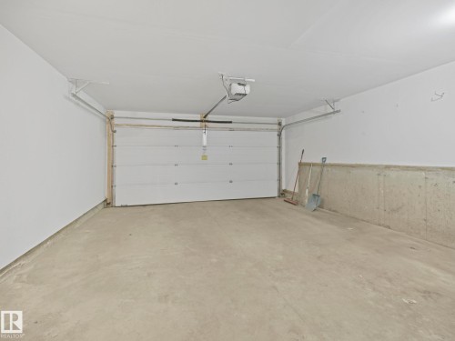 11 4470 Prowse Road, Edmonton, AB - Indoor Photo Showing Garage