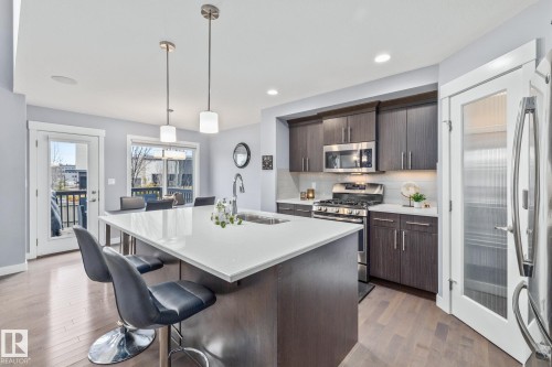 17504 13 Avenue, Edmonton, AB - Indoor Photo Showing Kitchen With Stainless Steel Kitchen With Double Sink With Upgraded Kitchen