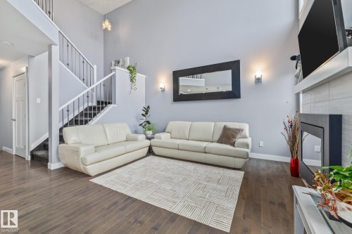 17504 13 Avenue, Edmonton, AB - Indoor Photo Showing Living Room With Fireplace