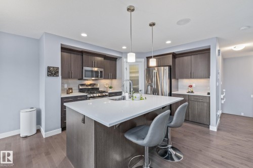 17504 13 Avenue, Edmonton, AB - Indoor Photo Showing Kitchen With Stainless Steel Kitchen With Double Sink With Upgraded Kitchen