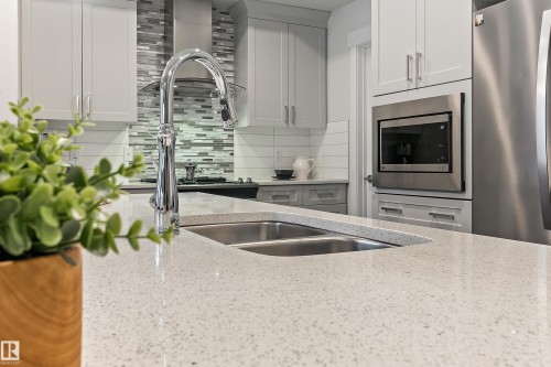 2140 Koshal Way, Edmonton, AB - Indoor Photo Showing Kitchen With Double Sink With Upgraded Kitchen