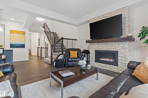 2140 Koshal Way, Edmonton, AB - Indoor Photo Showing Living Room With Fireplace