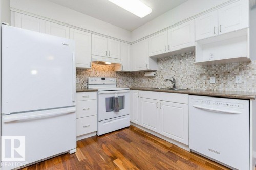 208 8802 Southfort Drive, Fort Saskatchewan, AB - Indoor Photo Showing Kitchen