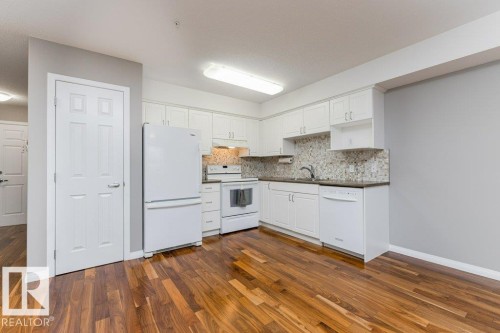 208 8802 Southfort Drive, Fort Saskatchewan, AB - Indoor Photo Showing Kitchen